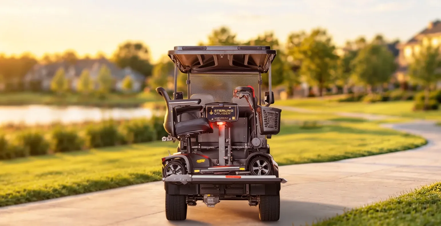 Rear view of the Sterling Cruiser with a mobility scooter on its integrated lift